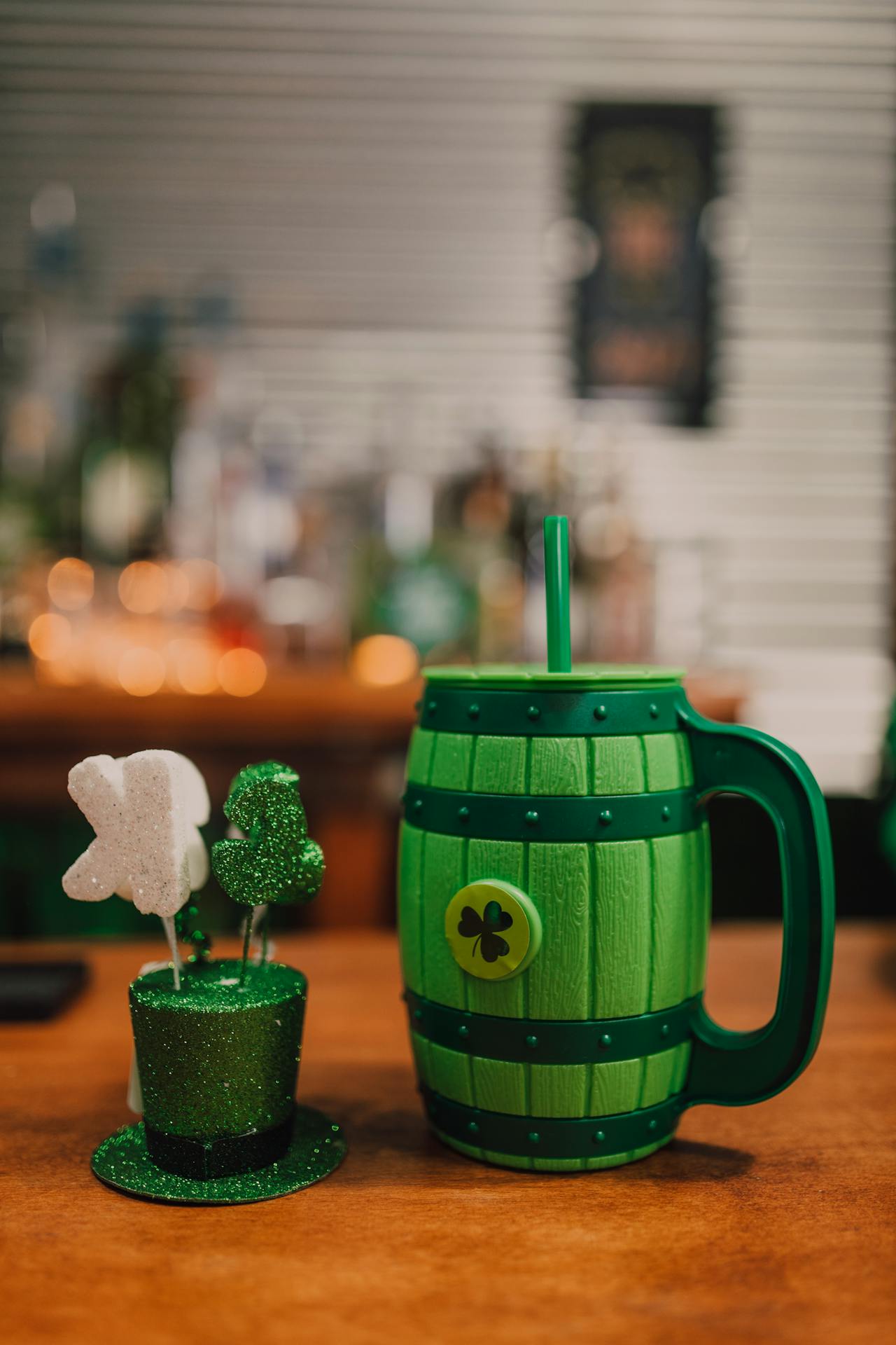 Photo by RDNE Stock project: https://www.pexels.com/photo/a-green-barrel-mug-on-top-of-a-wooden-table-7061452/ st. patrick's day